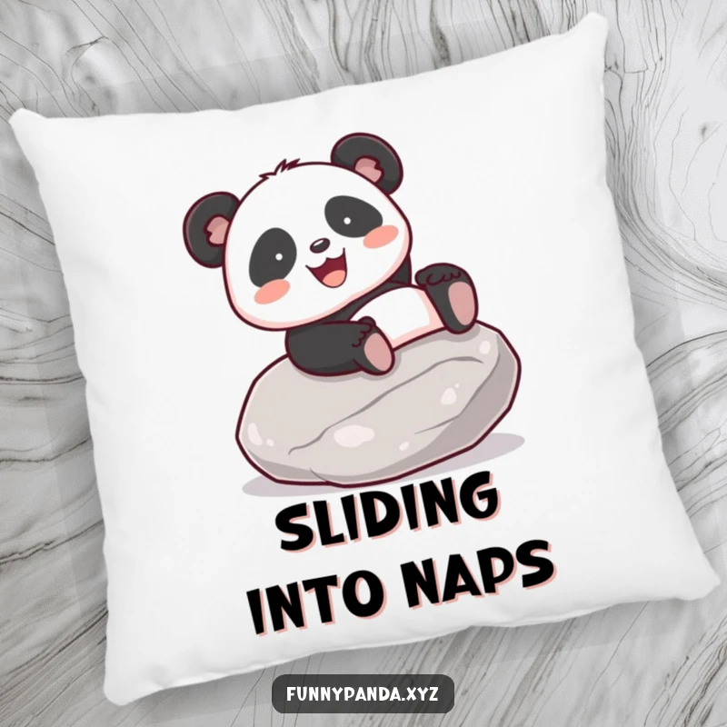 Funny kawaii panda gleefully sliding down a smooth stone, featured on a soft, decorative pillow.