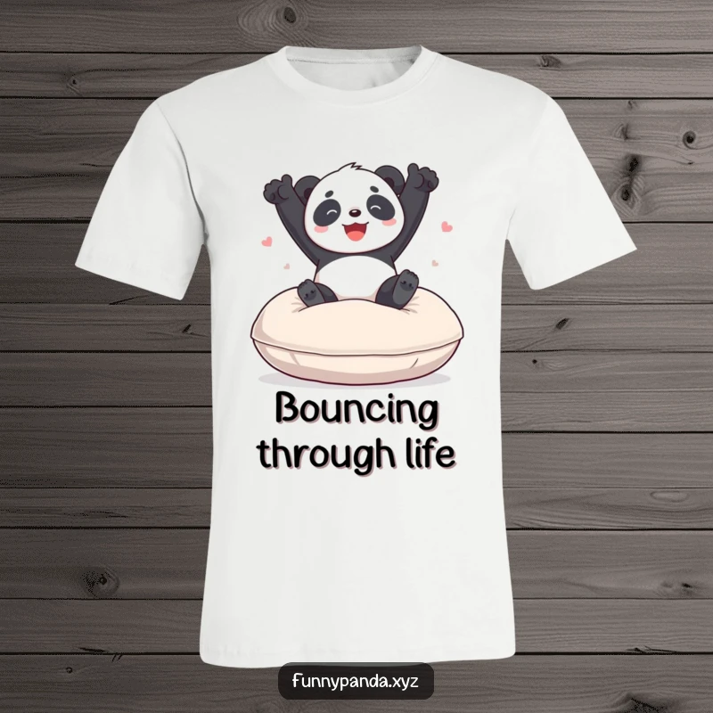 Funny panda t-shirt depicting a joyful panda energetically bouncing up and down on a giant, plush cushion with ecstatic expression.